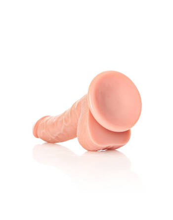 DILDO REALISTA CON TESTICULOS CURVED 7 /18CM FLESH REALROCK